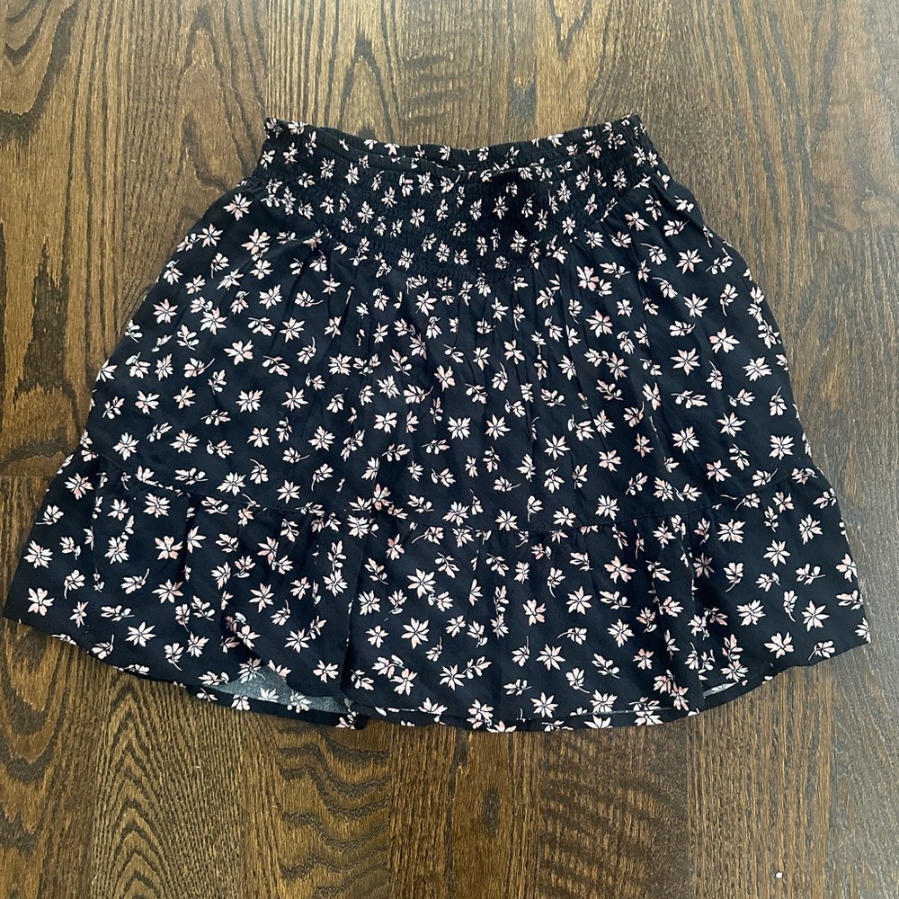 SO mini skirt.  Size medium.  Peachy pink white flowers.